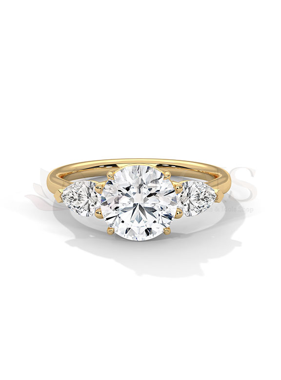 Timeless Round and Pear Three Stone Diamond Engagement Ring
